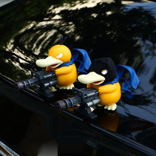 Pokemon Psyduck with Gun Anime Figure